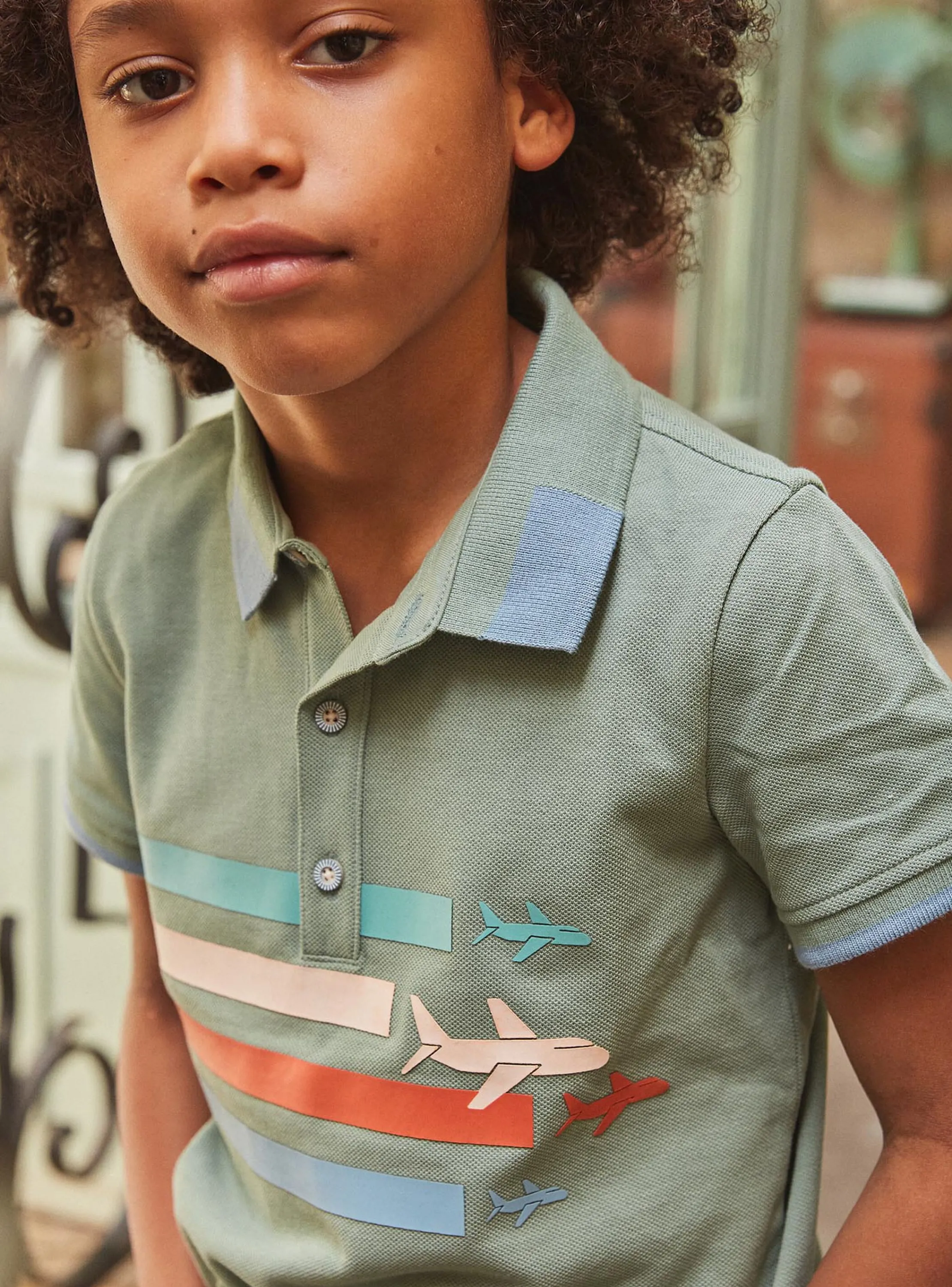 Shop Sergent Major Green polo shirt with aircraft motif